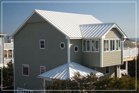 metal roof on white house|white roofing shingles.